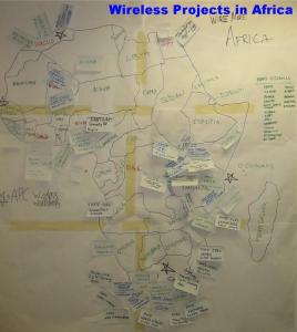 Wireless trainers put labels on a map of Africa to indicate wireless initiatives now functioning as a result of the four trainings carried out in 2005-2006. Photo: APC