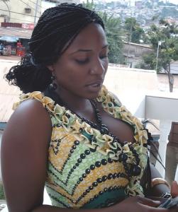 Girl sending SMS: photo by EOSCameroun : http://www.flickr.com/photos/kameni/1549886895/