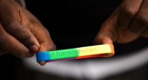 End Homophobia wrist band, Dec 2010. © Felix Masi/Demotix