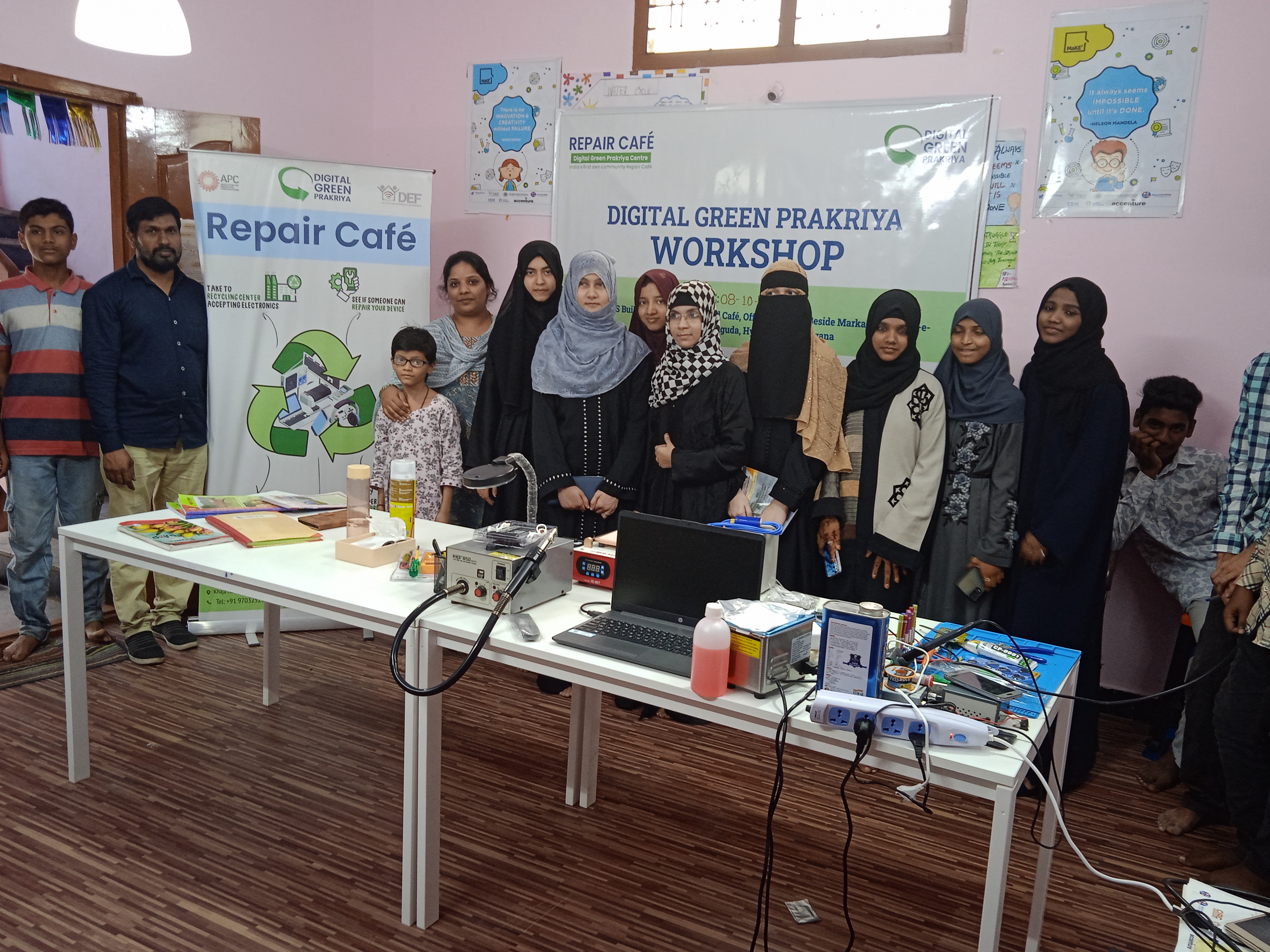 Participants of a repair café organised by DEF.