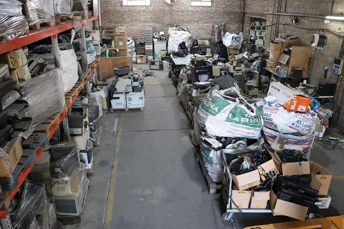Piles of e-waste await processing at the Nodo TAU treatment plant.