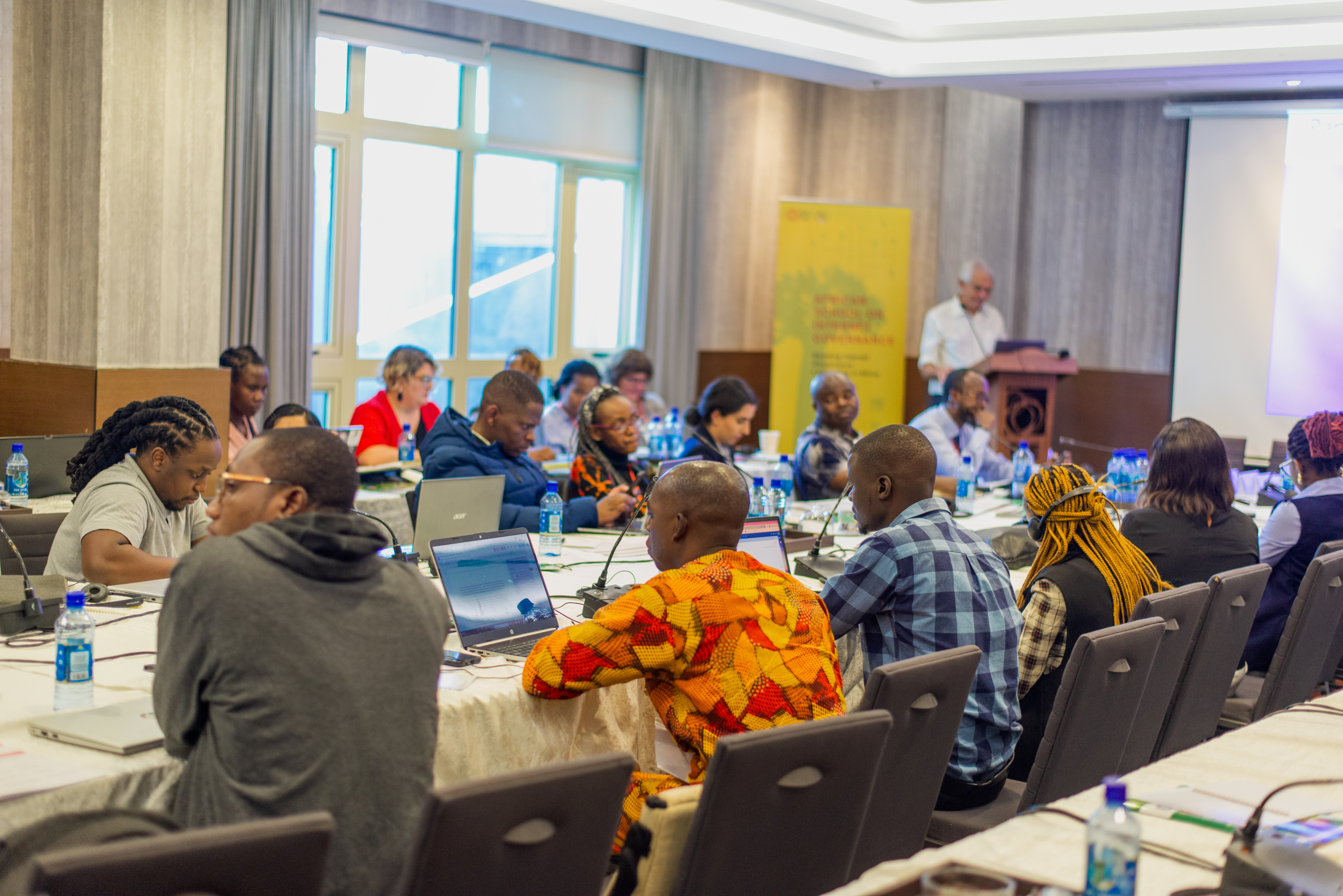 Image of AfriSIG 2023 listening to a presentation.