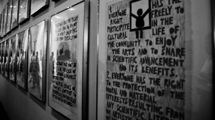 Image by Zack Lee, used under Creative Commons license. Photo of framed representations of each human right included in the Declaration of Human Rights at UN.