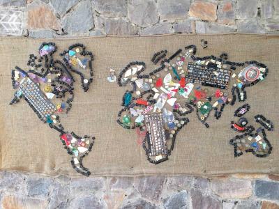 The world map made out of e-waste by Digital Empowerment Foundation image linking to The role of digitalisation in collective action to end plastic pollution 