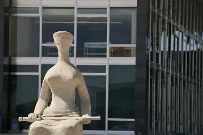 Sculpture Justice, located in front of the Supreme Court building in Brazil. image linking to Brazil explores ways to hold platforms accountable in court and beyond