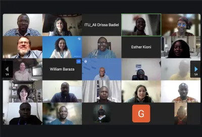 Screenshot of a virtual meeting with 20 participants displayed in a grid, each person shown in their own video frame with a few names visible.